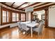 Dining room area featuring hardwood floors, beamed ceilings, natural light and vintage details at 780 N Lafayette St, Denver, CO 80218