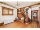 Elegant foyer with detailed woodwork, stained glass windows, and a classic staircase, adding character and charm at 780 N Lafayette St, Denver, CO 80218