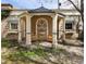 Charming gazebo with stone columns, arched mosaic fountain, and inviting seating area at 780 N Lafayette St, Denver, CO 80218