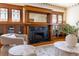 Inviting living room featuring a fireplace, beautiful woodwork, stained glass and decorative ceilings at 780 N Lafayette St, Denver, CO 80218