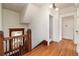 This staircase features wood banisters, detailed stained glass, and elegant, timeless design at 780 N Lafayette St, Denver, CO 80218