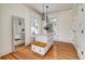This walk-in closet features a marble island, ample storage, and large windows for natural light at 780 N Lafayette St, Denver, CO 80218