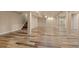 Spacious finished basement featuring wood-look floors, recessed lighting, and neutral paint at 12940 Jasmine St # A, Thornton, CO 80602