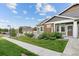 Inviting single-story home with stone accents and landscaped front yard and detached garages at 12940 Jasmine St # A, Thornton, CO 80602