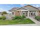 Charming single-story home with stone accents and landscaped front yard at 12940 Jasmine St # A, Thornton, CO 80602