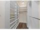 Large walk-in closet featuring shelving and hanging space at 12940 Jasmine St # A, Thornton, CO 80602