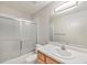 Bright bathroom with a tub and a shower at 11978 W Aqueduct Dr, Littleton, CO 80127