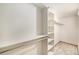 Walk-in closet with built-in shelving and ample storage space at 11978 W Aqueduct Dr, Littleton, CO 80127