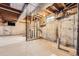 Unfinished basement space with concrete walls and floor, exposed duct work and utilities at 9134 Bellaire St, Thornton, CO 80229