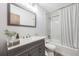 Bathroom with a modern vanity, updated fixtures, and a shower-tub combination at 9134 Bellaire St, Thornton, CO 80229
