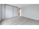 Cozy bedroom featuring a spacious closet and neutral walls and carpet at 9134 Bellaire St, Thornton, CO 80229