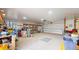 Spacious garage with ample storage, workbenches, and an electric garage door at 2545 N State Highway 67, Sedalia, CO 80135