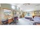 Cozy main bedroom with vaulted ceilings, a separate office space, and balcony access at 2545 N State Highway 67, Sedalia, CO 80135