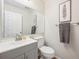 Bathroom with neutral paint, towel rack, and vanity at 10520 W Fair Ave # A, Littleton, CO 80127