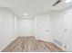 This bedroom offers neutral colors and modern wood-look vinyl flooring at 10520 W Fair Ave # A, Littleton, CO 80127
