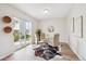 Bright dining area featuring sliding glass doors and modern decor at 10520 W Fair Ave # A, Littleton, CO 80127
