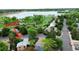 An aerial view of a community near a lake with mature trees and well maintained street and green spaces at 4677 S Salida St, Aurora, CO 80015