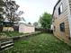 The backyard features a storage shed, partial fence, and mature trees for shade at 4677 S Salida St, Aurora, CO 80015