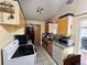 Functional kitchen with essential appliances and plenty of cabinet space at 4677 S Salida St, Aurora, CO 80015