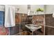 Stylish bathroom with unique tiling, a modern sink, and elegant fixtures at 8544 Burning Tree Trl, Franktown, CO 80116