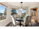 Charming dining nook with lots of natural light and beautiful views at 8544 Burning Tree Trl, Franktown, CO 80116