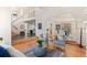 Inviting living room featuring a staircase, stylish decor, and an open layout, creating a seamless flow at 8544 Burning Tree Trl, Franktown, CO 80116