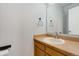 Cozy bathroom with modern sink, mirror, and lighting fixtures at 10470 W 83Rd Ave, Arvada, CO 80005