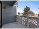 Charming patio area with a lattice railing and view at 10470 W 83Rd Ave, Arvada, CO 80005