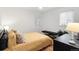 Bedroom with hardwood floors, neutral walls, and simple modern decor at 3739 W 46Th Ave, Denver, CO 80211