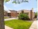 Inviting home with a well-kept lawn and a quaint brick facade, perfect for curb appeal at 3739 W 46Th Ave, Denver, CO 80211