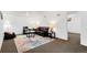 Basement living room area with modern rug and furniture at 3739 W 46Th Ave, Denver, CO 80211