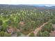 High-angle view of property surrounded by forest at 2378 Hearth Dr # 20, Evergreen, CO 80439