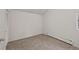 Bright bedroom featuring neutral paint, carpet, baseboard heat and closet at 2378 Hearth Dr # 20, Evergreen, CO 80439