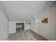 Neutral bedroom featuring carpet, walk-in closet, shelving and an exterior window detail at 2378 Hearth Dr # 20, Evergreen, CO 80439