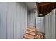Exterior entrance to a home with a short stairwell leading to the front door at 2378 Hearth Dr # 20, Evergreen, CO 80439