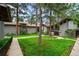 Well-maintained condo community with mature trees and manicured green space at 2378 Hearth Dr # 20, Evergreen, CO 80439
