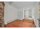 Living room features stone fireplace and wood floors at 2378 Hearth Dr # 20, Evergreen, CO 80439