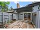 Enclosed back patio accessible through glass sliding doors, provides an outdoor space for relaxing at 2378 Hearth Dr # 20, Evergreen, CO 80439