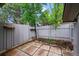 Cozy fenced-in patio with pavers, offering a private outdoor space at 2378 Hearth Dr # 20, Evergreen, CO 80439