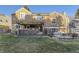 Charming home featuring a well-manicured lawn, covered patio, deck with grill, and inviting outdoor space at 7273 E Hinsdale Pl, Centennial, CO 80112