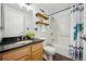 Bathroom with shower, bath, and modern sink at 444 17Th St # 208, Denver, CO 80202