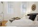 Bright main bedroom featuring natural light, and minimalist décor at 444 17Th St # 208, Denver, CO 80202