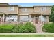 Multi-Gathering home featuring a deck, steps to the front door, and well manicured landscaping at 9770 Dahlia Ln, Thornton, CO 80229
