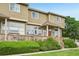 Multi-Gathering home featuring a deck, steps to the front door, and well manicured landscaping at 9770 Dahlia Ln, Thornton, CO 80229