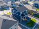 Backyard aerial view showcasing a white fence, a patio, and a gravel-filled landscaped area at 4851 Cattle Cross Rd, Castle Rock, CO 80104