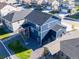 Backyard aerial view featuring a white fence, gravel landscaping, and a private back porch at 4851 Cattle Cross Rd, Castle Rock, CO 80104