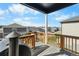 Outdoor deck with grill and backyard views, perfect for entertaining guests at 4851 Cattle Cross Rd, Castle Rock, CO 80104