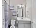 Clean bathroom with vanity, mirror, and shower featuring modern fixtures and decor at 4851 Cattle Cross Rd, Castle Rock, CO 80104