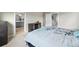 Spacious main bedroom featuring ensuite bathroom with double sinks and walk-in closet at 4851 Cattle Cross Rd, Castle Rock, CO 80104