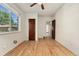 Empty bedroom with hardwood floors and window views at 521 Harrison St, Denver, CO 80206